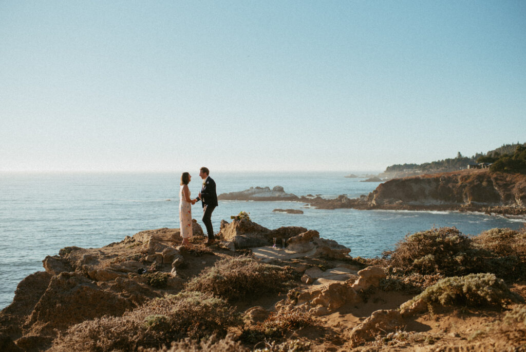Couple Eloping, overlooking the ocean at Timber Cove Resort