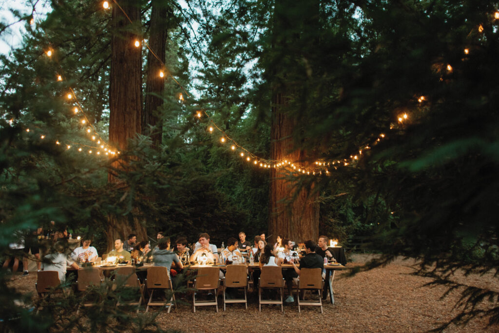 Dinner under the redwoods with string lights at AutoCamp Sonoma in Russian River
