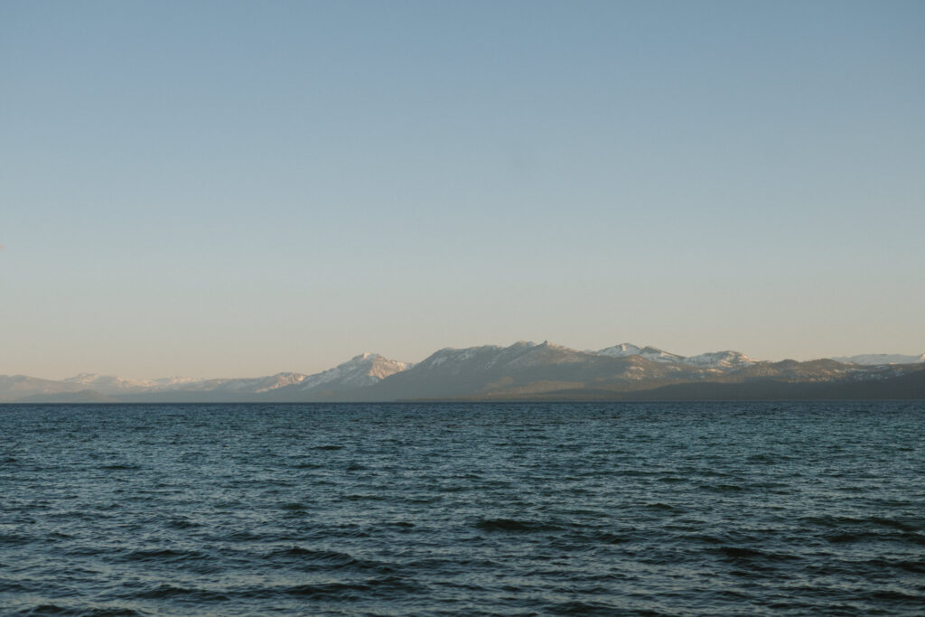Landscape Photo of Lake Tahoe with snow capped mountains